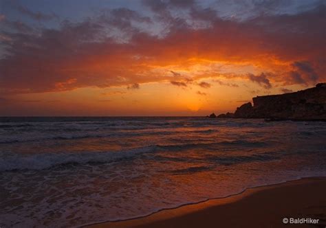 A Malta sunset from Golden Bay Beach