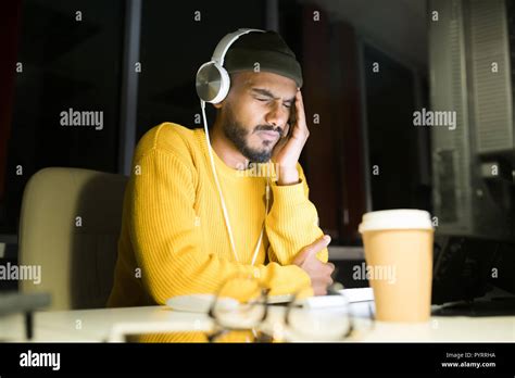 Stressed Young Man at Work Stock Photo - Alamy