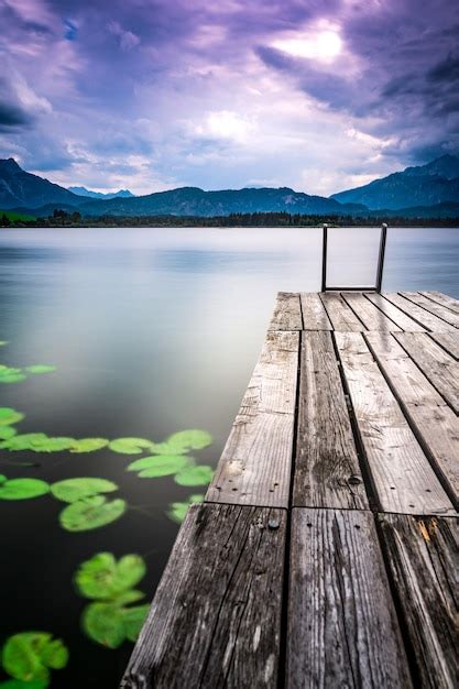 Premium Photo Wooden Pier Over Lake Against Sky