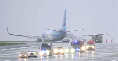 Plane Skids Off Runway During Storm Babet