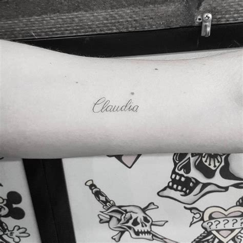 Tattoo Of The Name Claudia Located On The Bicep