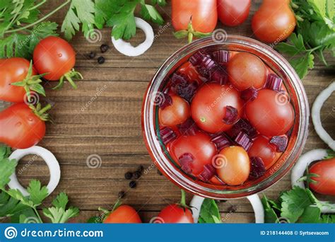 The Process Of Harvesting Canning Salting Or Pickling Red Tomatoes