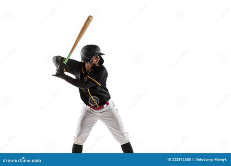 Baseball Player Pitcher In A Black White Sports Uniform Practicing