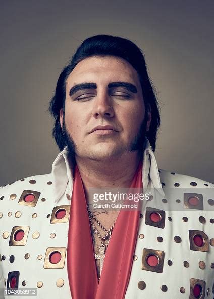 Elvis tribute artist Steve Knight a bricklayer from London poses ...