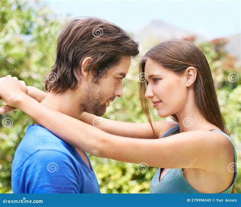 Sharing An Intimate Moment A Attractive Couple With The Womans Arms