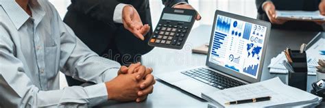 Auditor Team Working In Office Analyzing Financial Data And Accounting