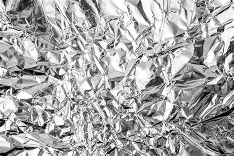 Abstract Crumpled Metal Aluminium Foil Texture And Background Stock