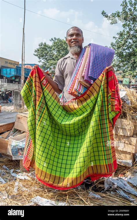 A man selling Lungis in Old Town Dhaka, Bangladesh Stock Photo - Alamy