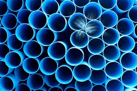 Premium Photo Blue Pvc Pipes Stacked