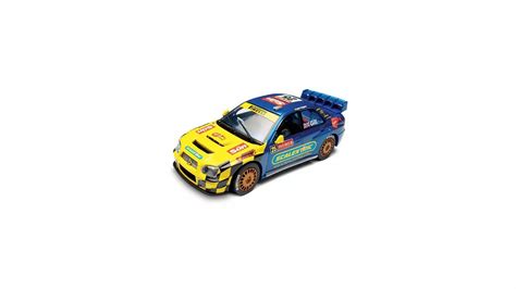 Scalextric C2666 Scalextric Subaru Impreza WRC N 25 The Sun Slot Car