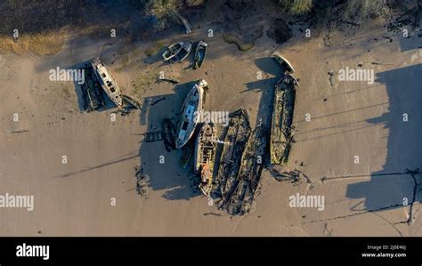 An Aerial View Of The Remains Of Old Boats On The River Orwell At Pin