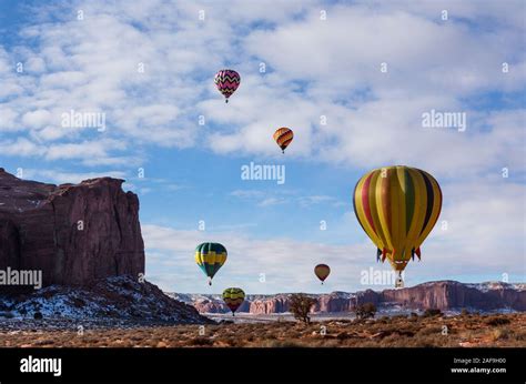 Six Hot Air Balloons Fly In The Monument Valley Balloon Festival In The