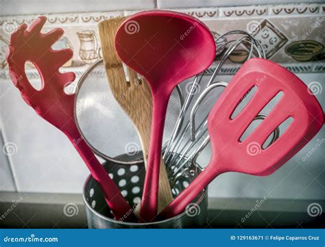 Kitchen Utensils of Red Color in a Kitchen Stock Image - Image of food ...