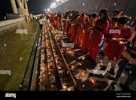 Women Lit Earthen Lamps During A Ritual To Celebrate Of The Grand