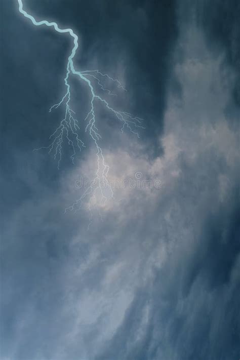 Dramatic Stormy Sky With Dark Clouds Lightning Flashes Over The Night