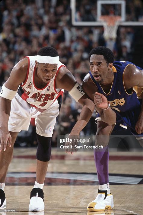 Forward Bonzi Wells of the Portland Trail Blazers covers guard Kobe ...