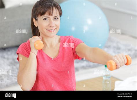Mature Woman Training Biceps Hi Res Stock Photography And Images Alamy