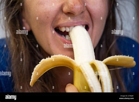 Woman Eats Food Woman Eats Banana Close Shot Of Girl Eating Bananas