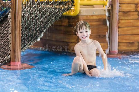 Happy Child in a Small Wading Pool Stock Photo - Image of blue ...