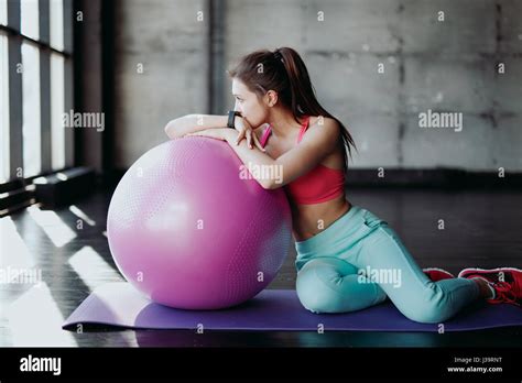 Fitness Sport Training And People Concept Smiling Woman Flexing