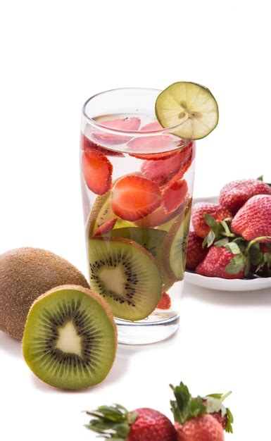 Premium Photo Infused Water Mix Of Strawberry And Kiwi Isolated