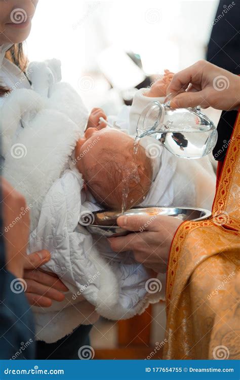 Infant Baptism Baptism Ceremony In Church Water Is Poured On The Head