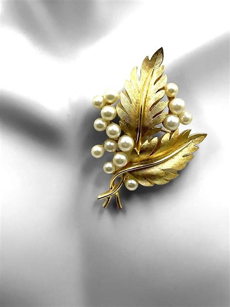 S Crown Trifari Gold Tone Faux Pearl Rhinestone Gem