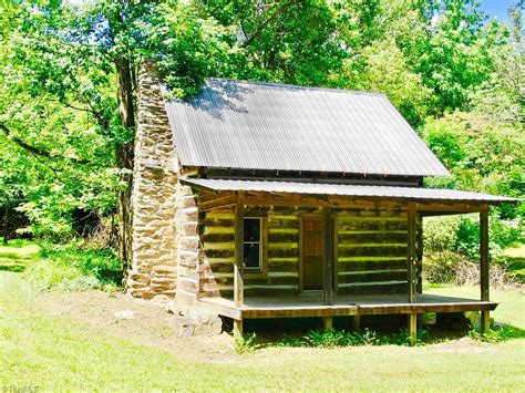 Chestnut Log Cabin And A Farmhouse On 29 Acres In VA Mountains