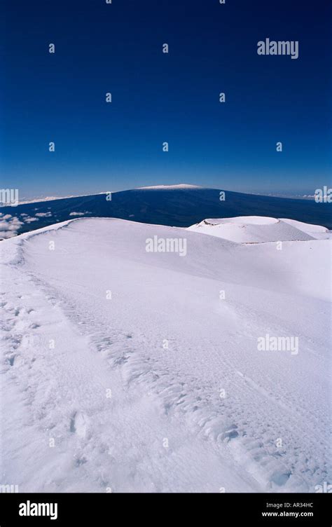 Mauna Kea summit with snow capped Mauna Loa in background Island of ...