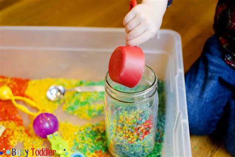 Rainbow Rice Sensory Bin - Busy Toddler