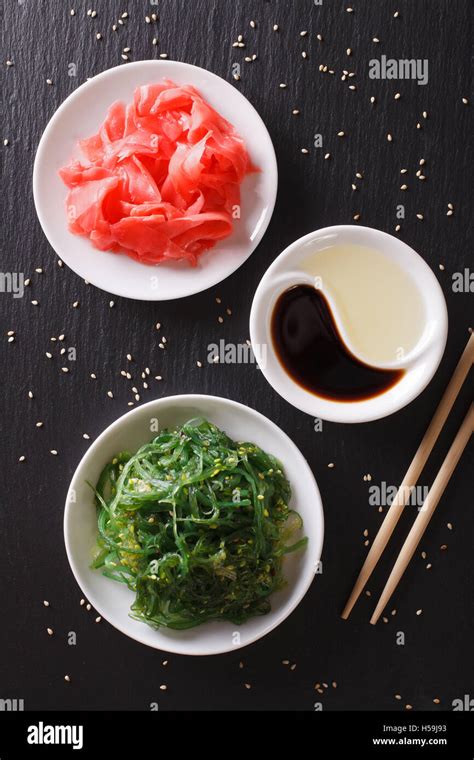 Japanese Wakame Seaweed Salad With Sesame Seeds On A Table Vertical