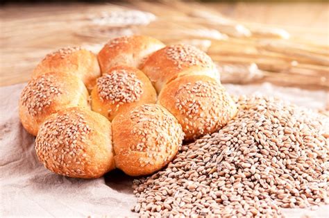 Bread On A Wooden Table With Wheat Grains Stock Image Everypixel