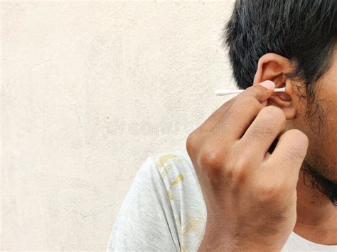 South Indian Man Cleaning His Ears With Cotton Bud Stock Image Image