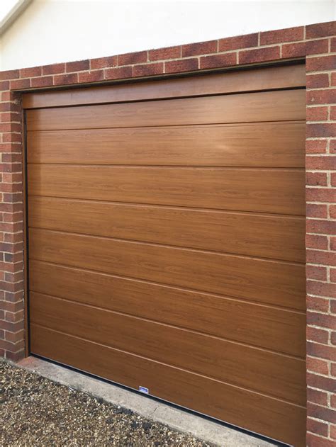 Insulated Sectional Garage Door In Golden Oak Preston Oxley Doors