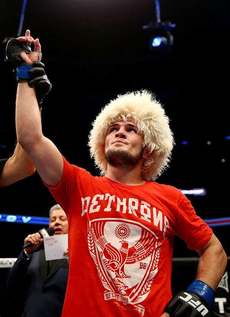 Khabib Nurmagomedov celebrates after defeating Pat Healy in their UFC ...