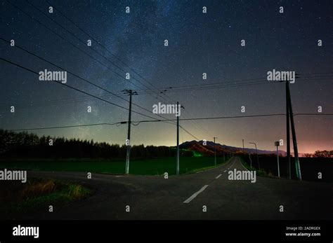 Milky way and road Stock Photo - Alamy