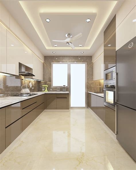 A Modern Kitchen With Stainless Steel Appliances And Marble Counter