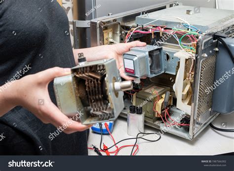 Repair Microwave Oven Woman Replaces Magnetron Stock Photo 1987566302 | Shutterstock