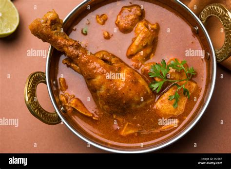 Indian Spicy Chicken Curry Or Masala Chicken With Prominent Leg Piece