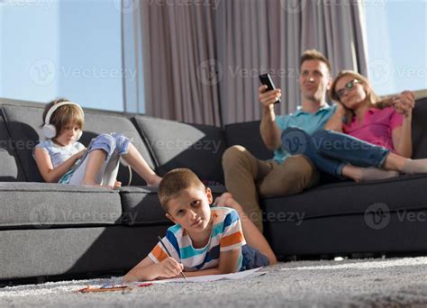 Family in livingroom 10707902 Stock Photo at Vecteezy