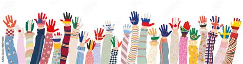 Arms raised up of multicultural children who have palms colored with the flags of various ...