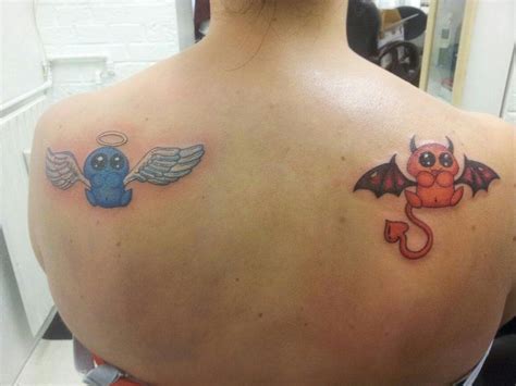 Devil And Angel Tattoo On Shoulder