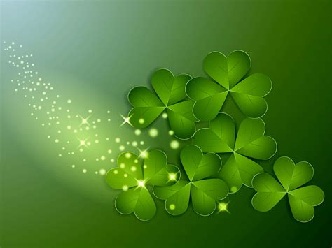 Download Shamrock Leaves On A Green Background