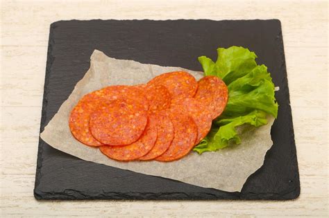 Pepperoni sausage dish 12730520 Stock Photo at Vecteezy