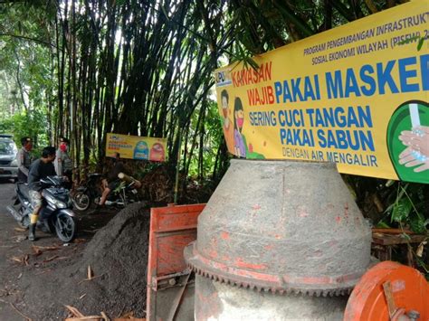 Kapolsek Susut Polres Bangli Edukasi Warga Agar Pakai Masker Dan Helm