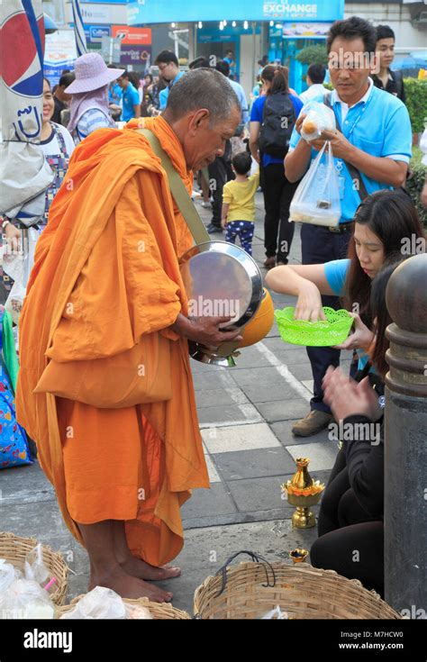 Thailand Bangkok Buddhist Monk Collecting Alms Stock Photo Alamy