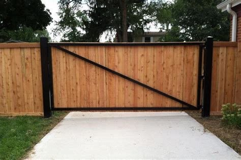 Back Side Of A Drive Gate Metal Frame Wood Slats Fence And Gate