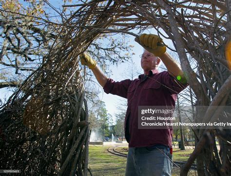 Artist Patrick Dougherty Works On His Art Installation Of Bent Twigs