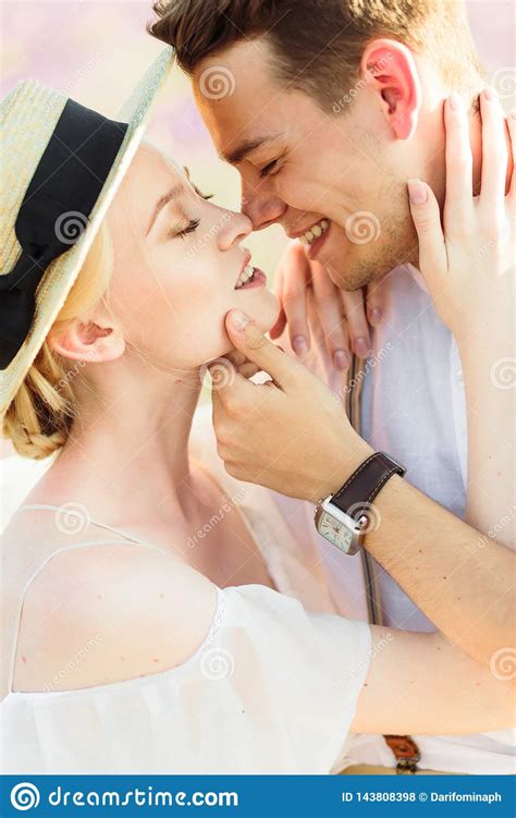 Beautiful Portrait Of Bride And Groom Hug Each Other Tender On Sunset