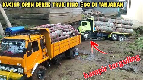 Hampir Terbalik Truk Hino Muatan Kayu Di Derek Fuso Saat Tidak Kuat